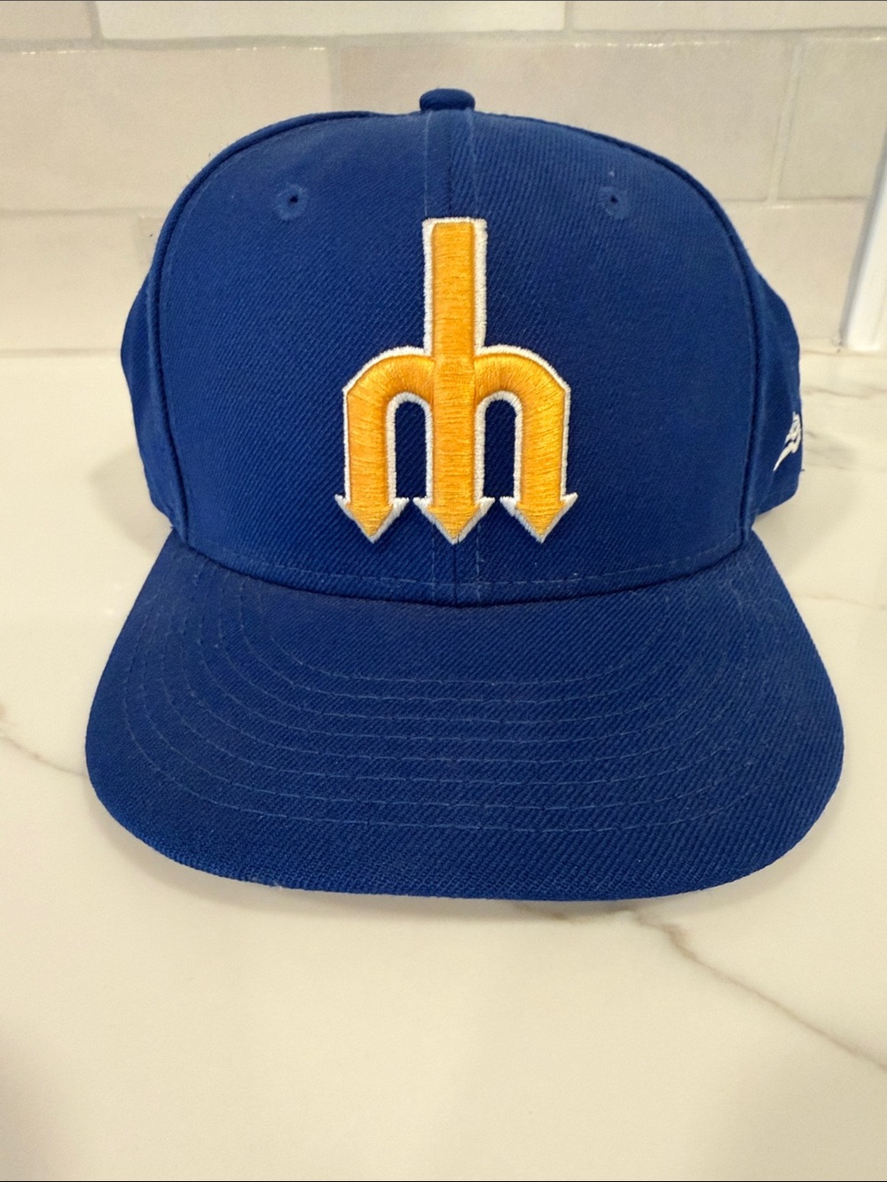 New Era Seattle Mariners Blue Baseball Cap with Yellow Embroidered Logo